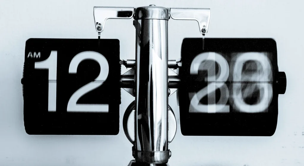 A flip clock showing 12:28