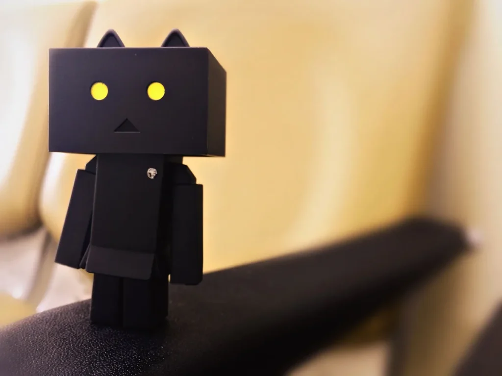 A small cardboard robot toy
